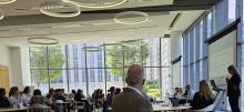 Group discussion at the Advancing Accessibility & Disability Equity Summit at the Shirley Ryan Ability Lab in Chicago being led by a presenter.