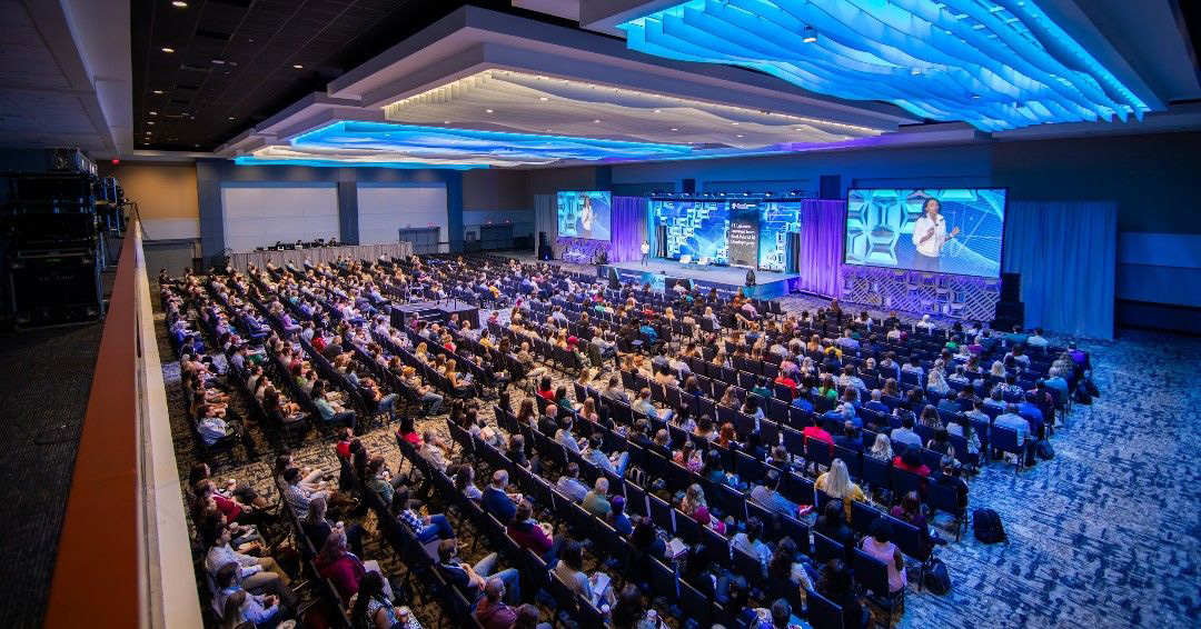 2024 keynote session held in Columbus Regency ballroom with a large crowd.