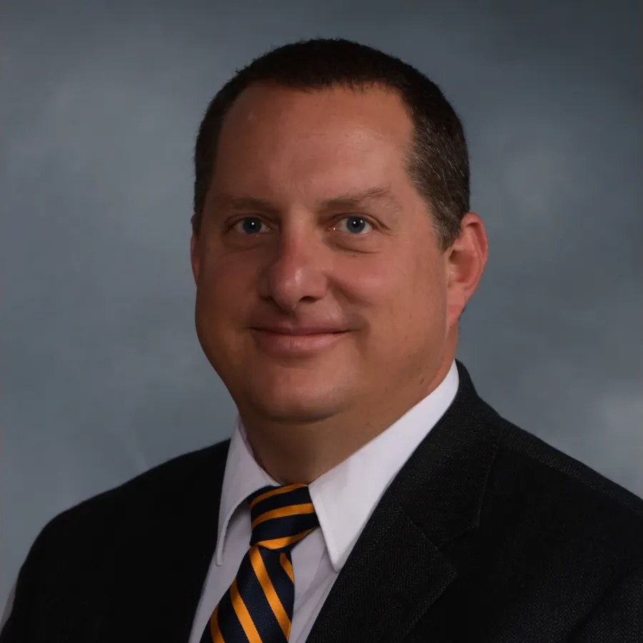 Headshot of Joel Hughes