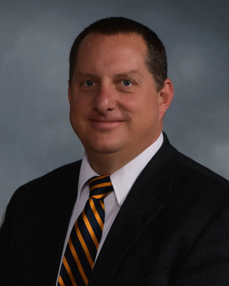 Headshot of Joel Hughes